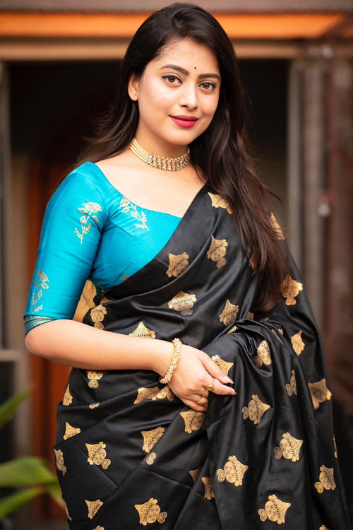 Load image into Gallery viewer, Elaborate Black and Firozi Soft Silk Saree With Piquant Blouse Piece
