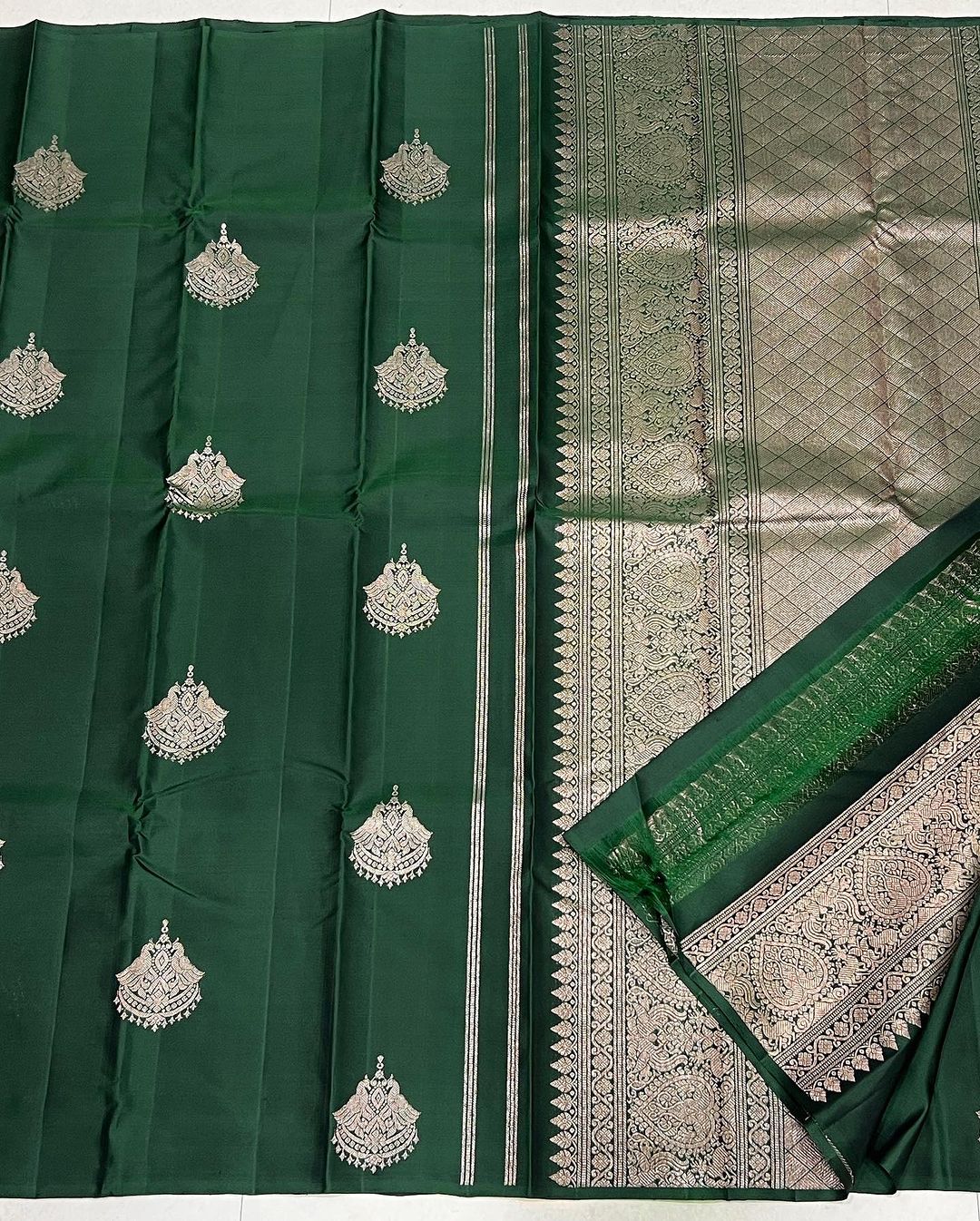 Pretty Dark Green Soft Silk Saree With Invaluable Blouse Piece