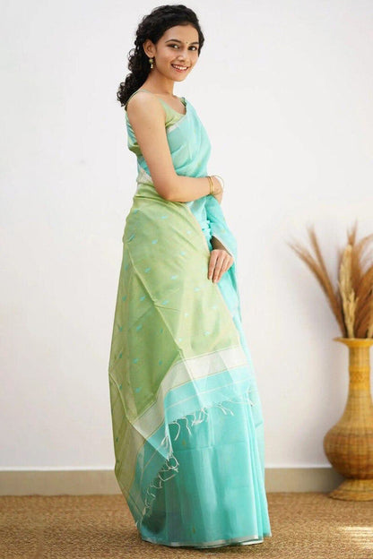 Mellifluous Sea Green Cotton Silk Saree With Staggering Blouse Piece