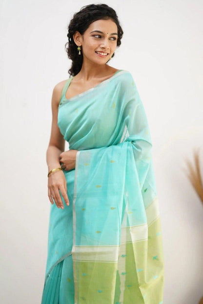 Mellifluous Sea Green Cotton Silk Saree With Staggering Blouse Piece
