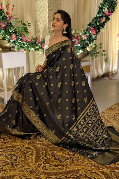 Prettiest Black Soft Silk Saree With Tantalizing Blouse Piece
