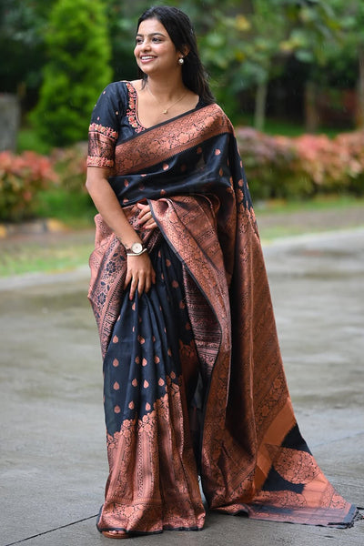 Gleaming Black Soft Silk Saree With Invaluable Blouse Piece