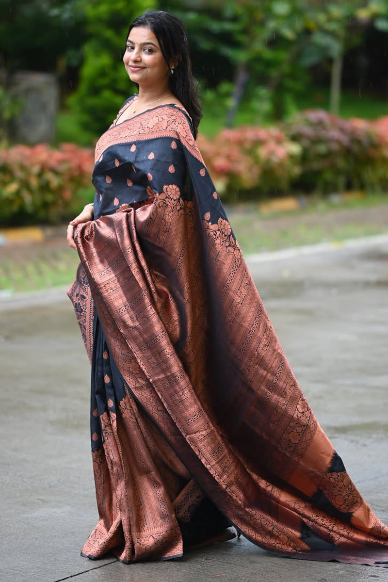 Gleaming Black Soft Silk Saree With Invaluable Blouse Piece