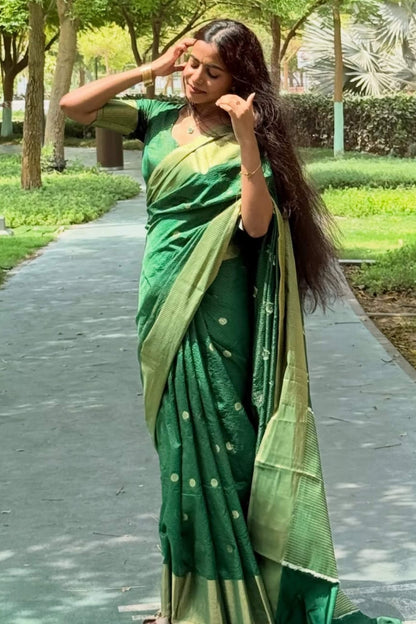 Exuberant Green Soft Silk Saree With Elision Blouse Piece