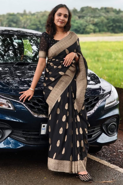 Delightful Black Soft Silk Saree With Gleaming Blouse Piece