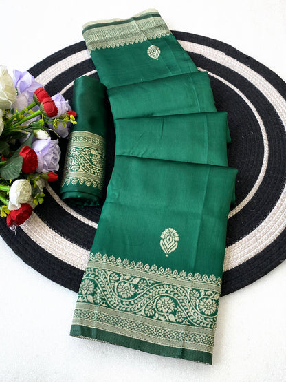 Luminous Green Soft Silk Saree With Cynosure Blouse Piece