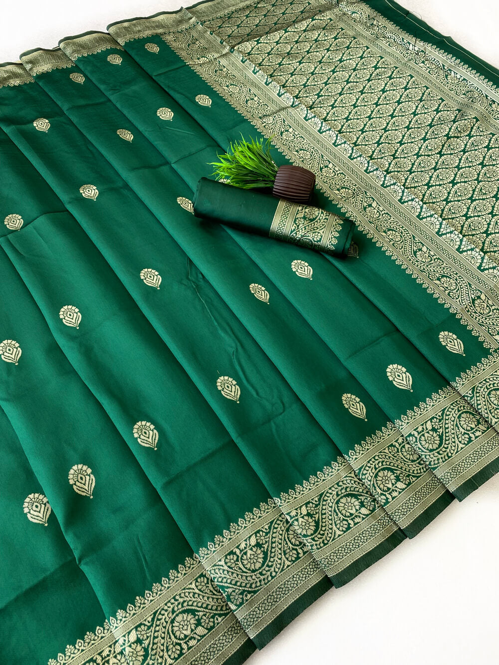 Luminous Green Soft Silk Saree With Cynosure Blouse Piece