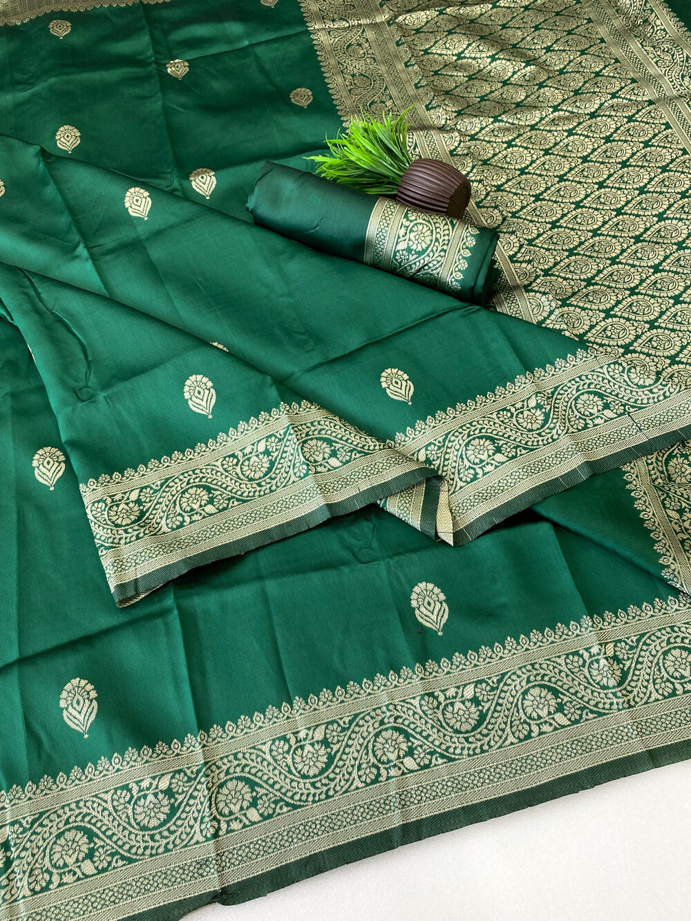 Luminous Green Soft Silk Saree With Cynosure Blouse Piece