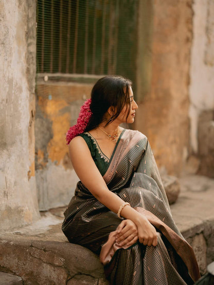 Impressive Dark Green Soft Silk Saree With Gossamer Blouse Piece