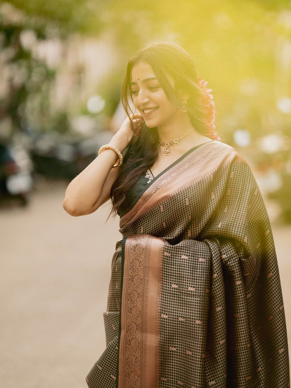 Impressive Dark Green Soft Silk Saree With Gossamer Blouse Piece