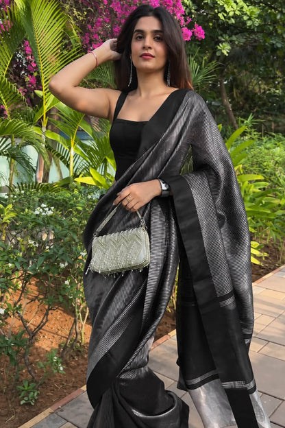 Scintillating Black Soft Silk Saree With Cynosure Blouse Piece