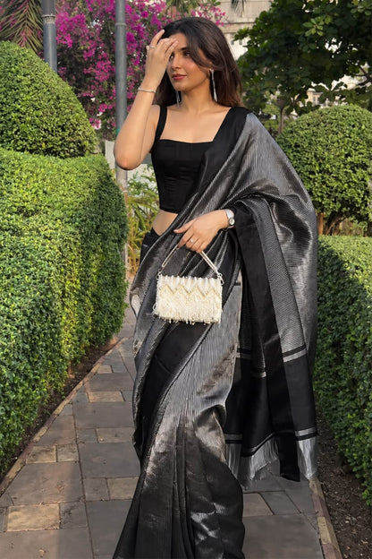 Scintillating Black Soft Silk Saree With Cynosure Blouse Piece