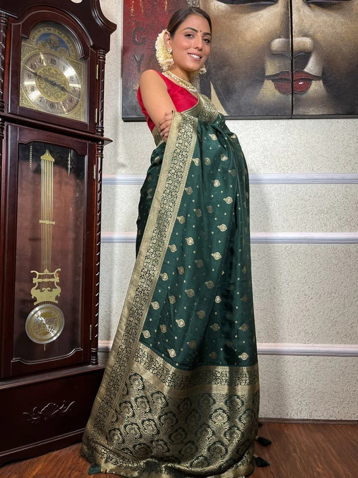 Pretty Dark Green Soft Silk Saree With Sensational Blouse Piece