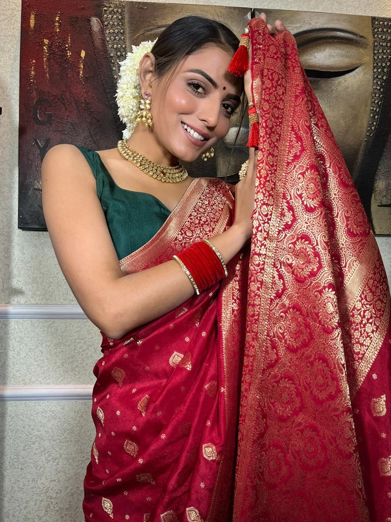 Cynosure Red Soft Silk Saree With Fugacious Blouse Piece