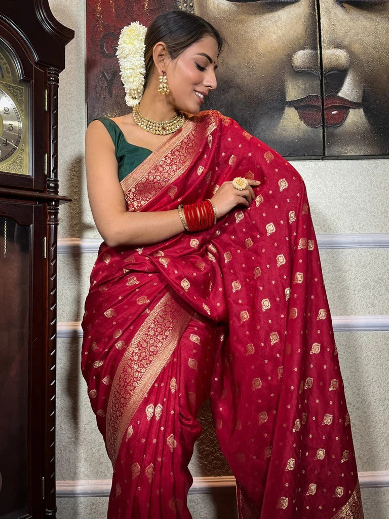 Cynosure Red Soft Silk Saree With Fugacious Blouse Piece