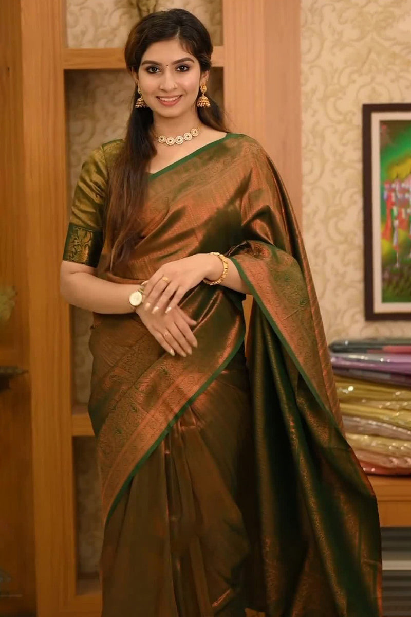 Lassitude Dark Green Soft Silk Saree With Devastating Blouse Piece