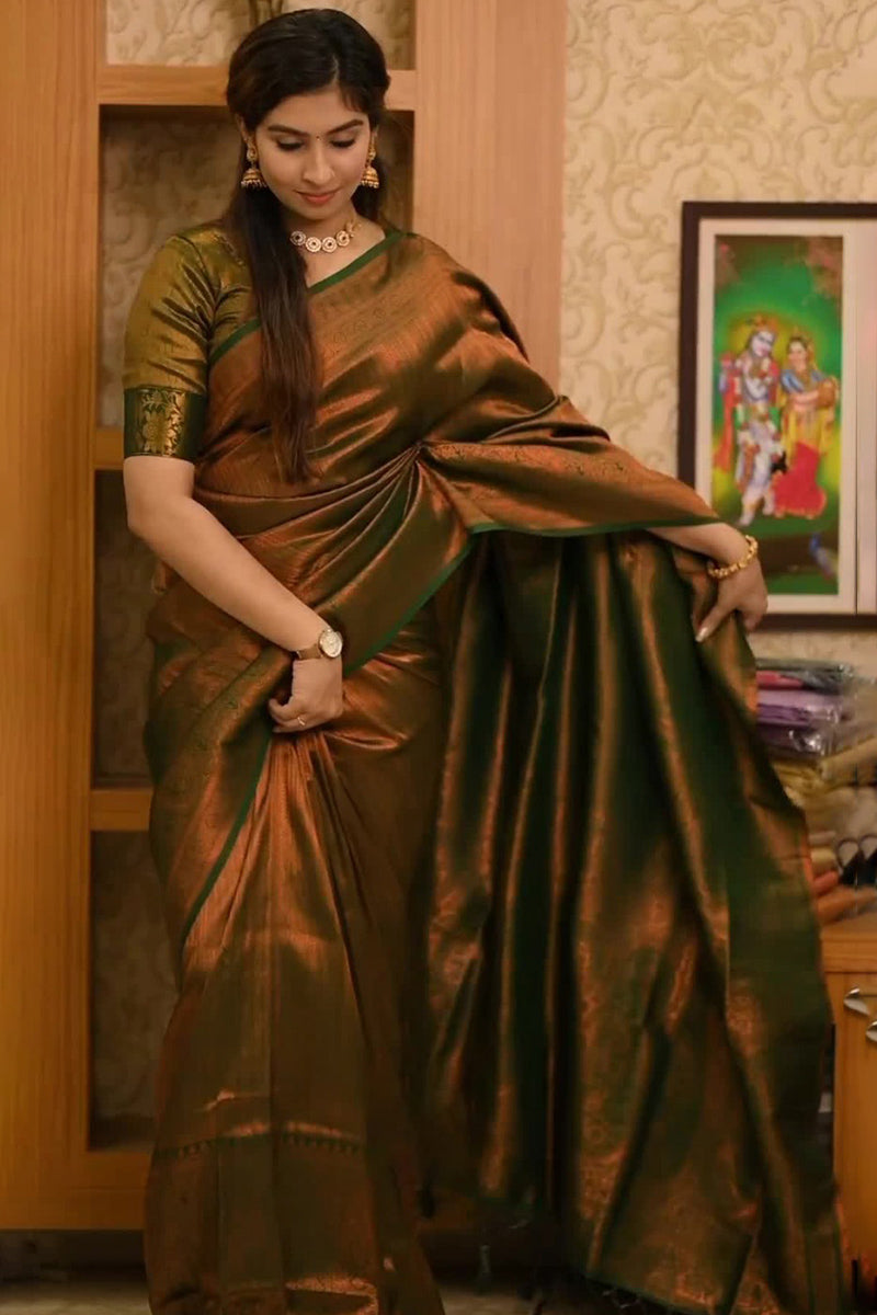 Lassitude Dark Green Soft Silk Saree With Devastating Blouse Piece