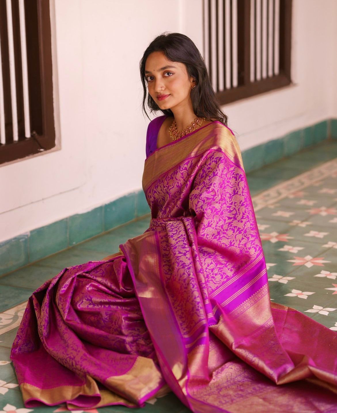 Evocative Magenta Soft Silk Saree With Demure Blouse Piece