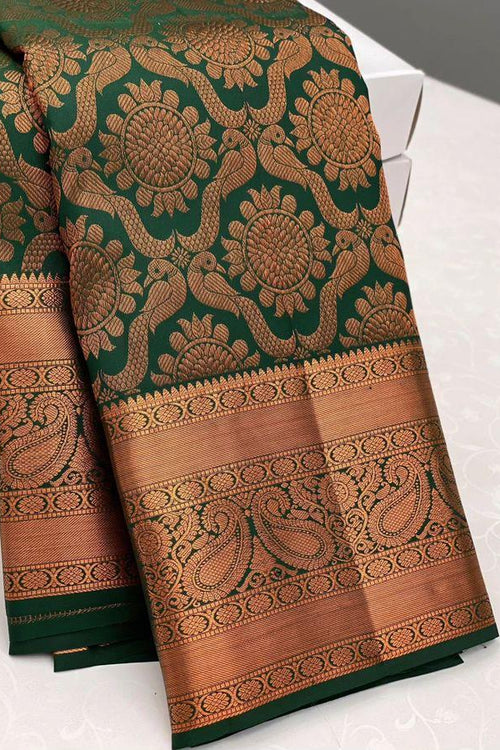 Load image into Gallery viewer, Palimpsest Dark Green Soft Silk Saree With Delectable Blouse Piece
