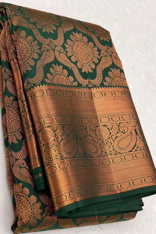 Load image into Gallery viewer, Palimpsest Dark Green Soft Silk Saree With Delectable Blouse Piece
