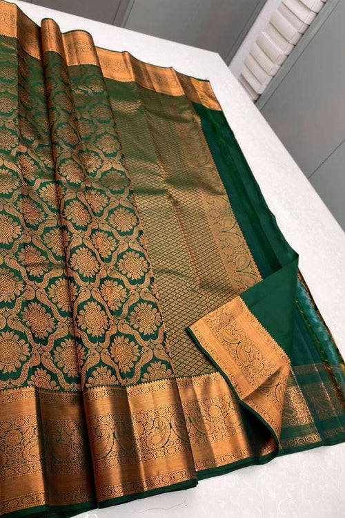 Load image into Gallery viewer, Palimpsest Dark Green Soft Silk Saree With Delectable Blouse Piece
