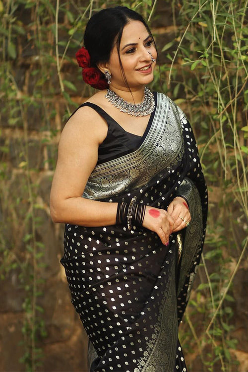 Load image into Gallery viewer, Mesmeric Black Soft Silk Saree With Breathtaking Blouse Piece
