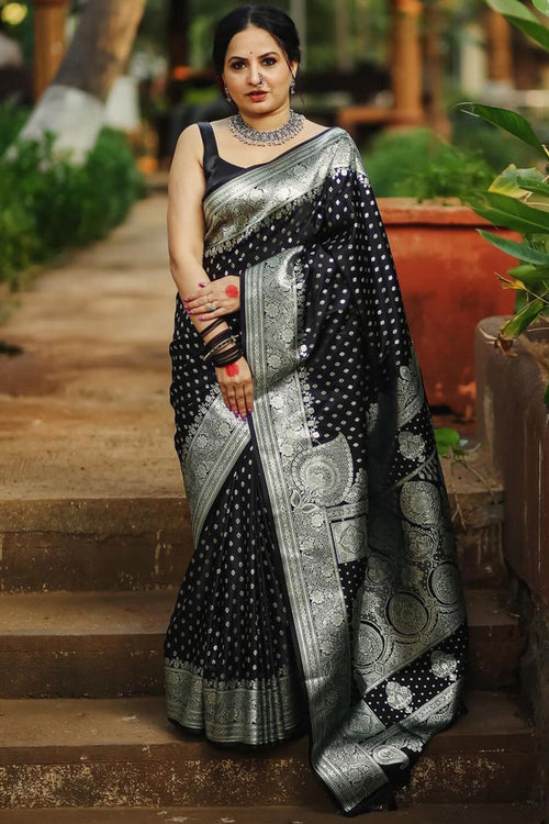 Load image into Gallery viewer, Mesmeric Black Soft Silk Saree With Breathtaking Blouse Piece
