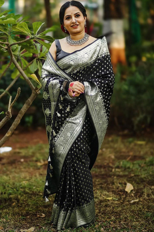 Load image into Gallery viewer, Mesmeric Black Soft Silk Saree With Breathtaking Blouse Piece
