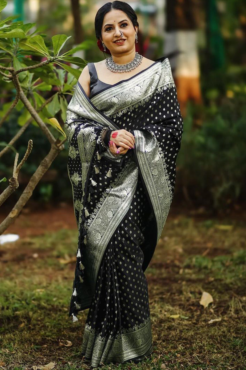 Mesmeric Black Soft Silk Saree With Breathtaking Blouse Piece