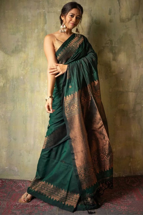 Load image into Gallery viewer, Opulent Dark Green Soft Silk Saree With Flameboyant Blouse Piece
