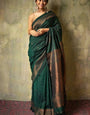 Opulent Dark Green Soft Silk Saree With Flameboyant Blouse Piece