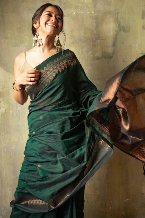 Load image into Gallery viewer, Opulent Dark Green Soft Silk Saree With Flameboyant Blouse Piece
