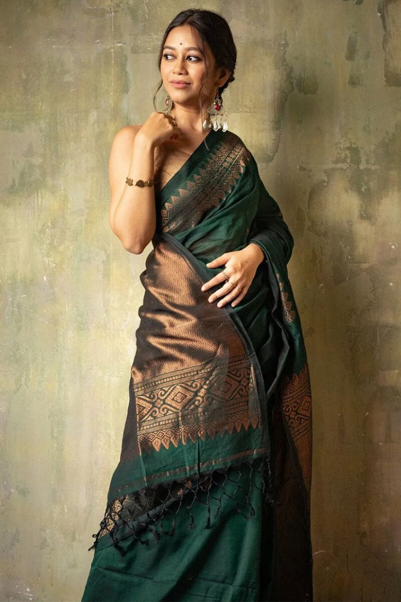 Opulent Dark Green Soft Silk Saree With Flameboyant Blouse Piece