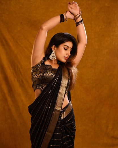 Sensational Black Soft Silk Saree With Precious Blouse Piece