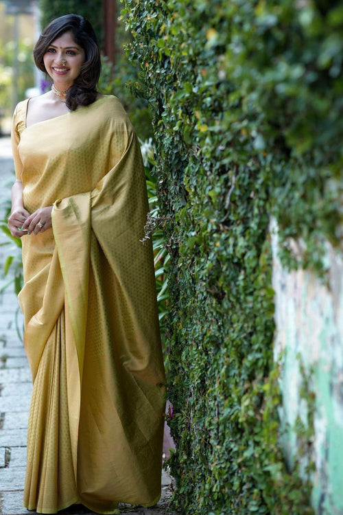 Load image into Gallery viewer, Eye-catching Yellow Soft Silk Saree With Blooming Blouse Piece
