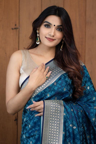 Diaphanous Teal Blue Soft Silk Saree With Elision Blouse Piece