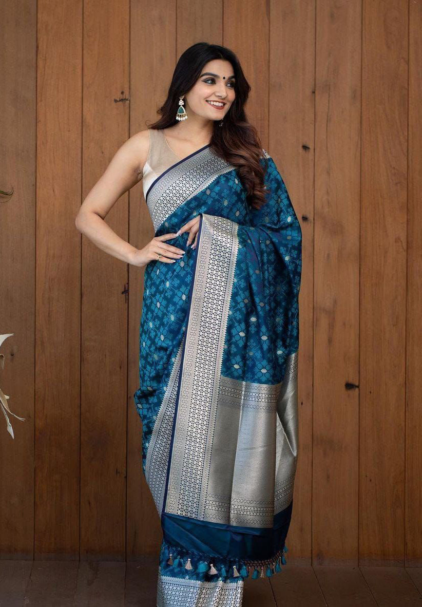 Diaphanous Teal Blue Soft Silk Saree With Elision Blouse Piece