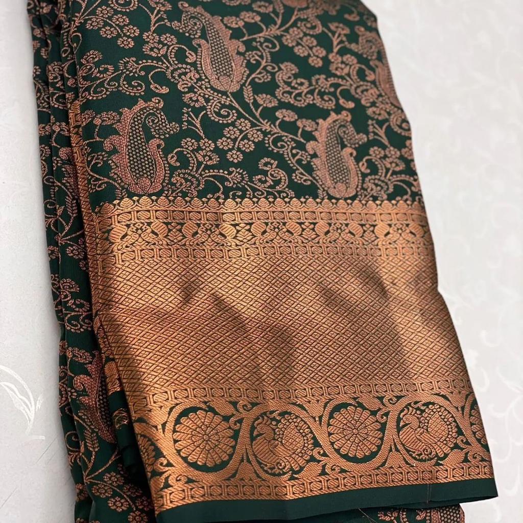 Fragrant Dark Green Soft Silk Saree With Delectable Blouse Piece