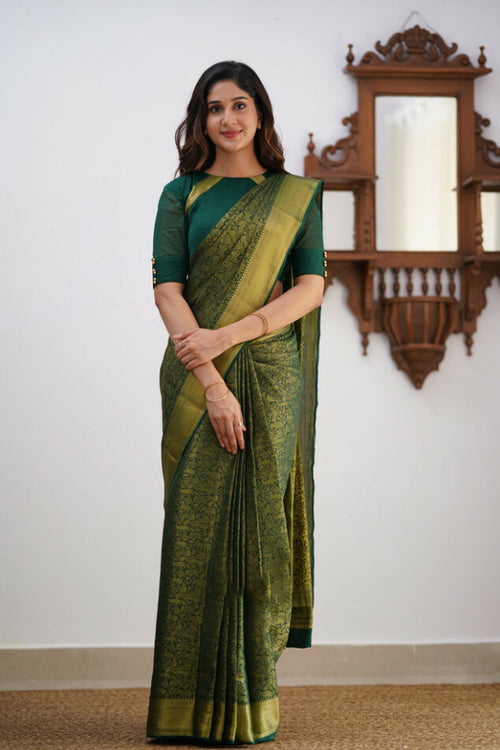 Load image into Gallery viewer, Gossamer Dark Green Soft Silk Saree With Diaphanous Blouse Piece
