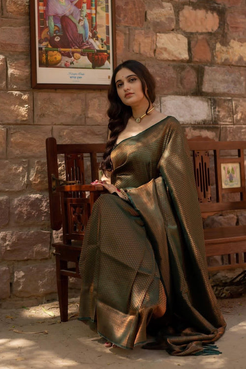 Load image into Gallery viewer, Engaging Dark Green Soft Silk Saree With Elaborate Blouse Piece
