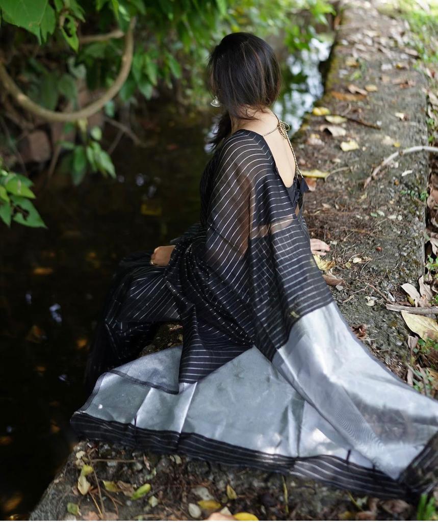 Intricate Black Soft Silk Saree With Whimsical Blouse Piece