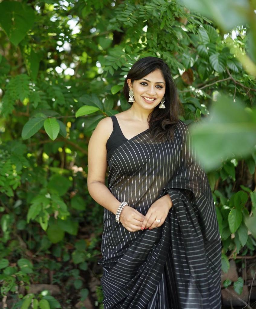 Intricate Black Soft Silk Saree With Whimsical Blouse Piece