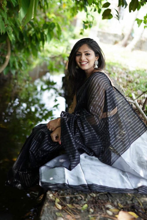 Load image into Gallery viewer, Intricate Black Soft Silk Saree With Whimsical Blouse Piece
