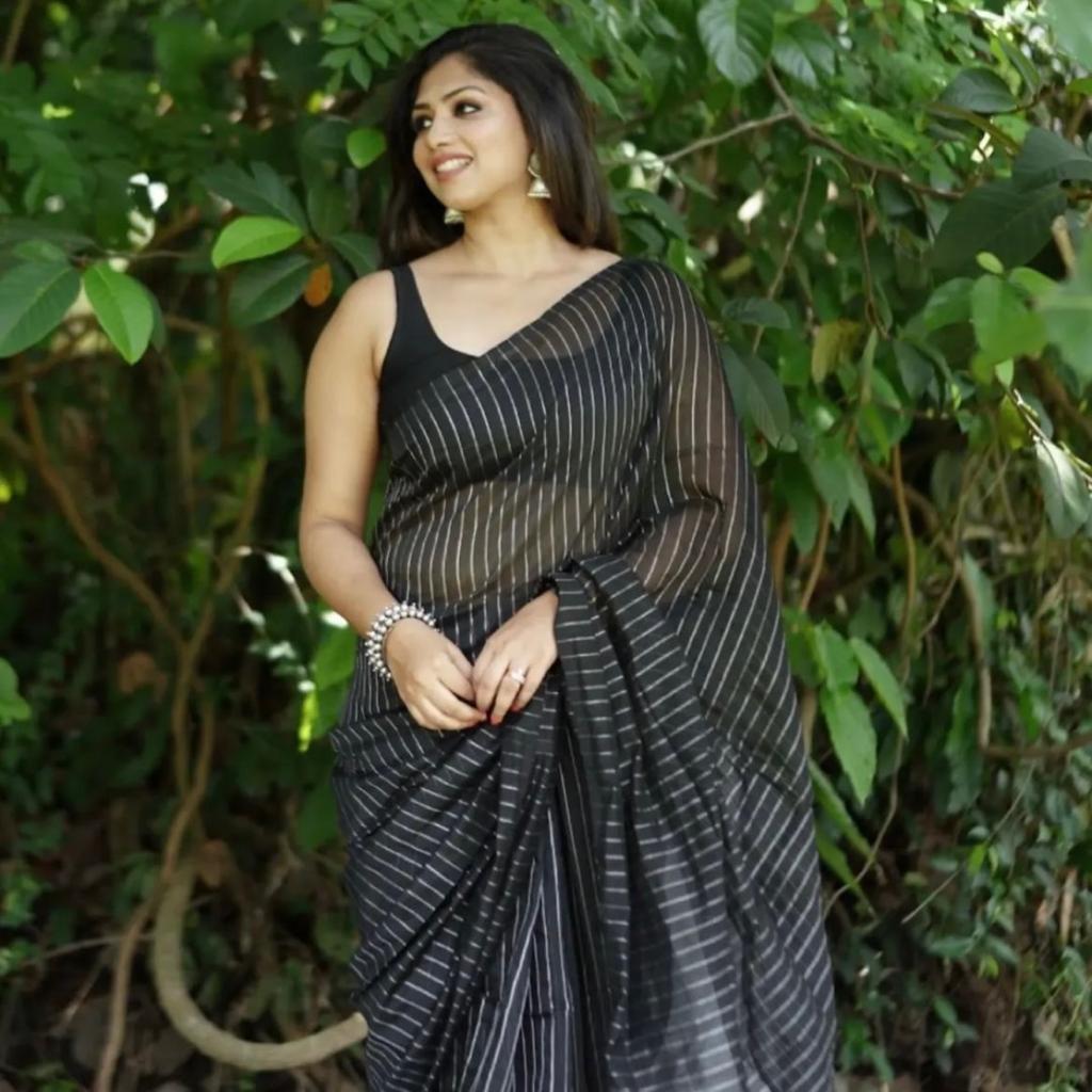 Intricate Black Soft Silk Saree With Whimsical Blouse Piece