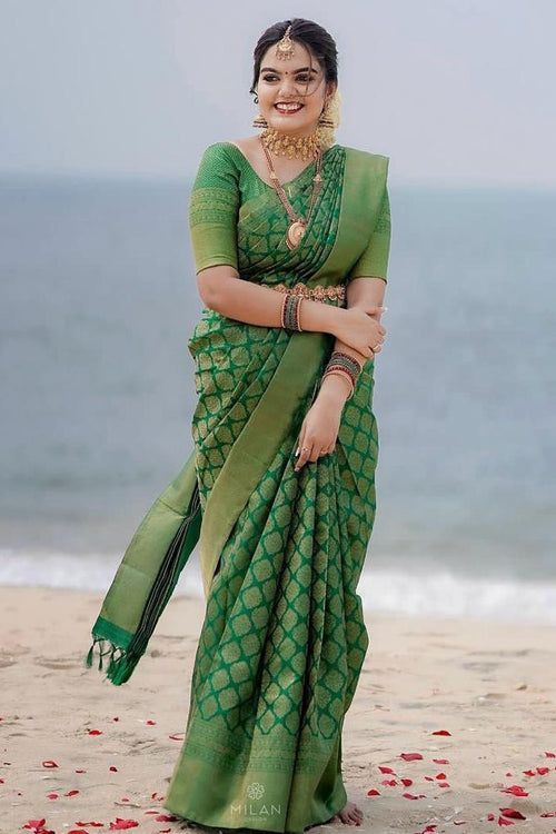 Load image into Gallery viewer, Stunner Green Soft Silk Saree With Opulent Blouse Piece
