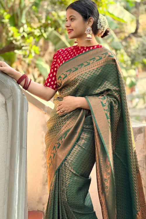 Load image into Gallery viewer, Snazzy Dark Green Soft Silk Saree With Woebegone Blouse Piece
