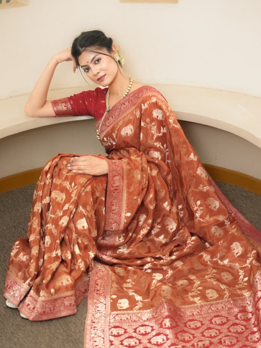 Classy Orange Soft Silk Saree With Piquant Blouse Piece