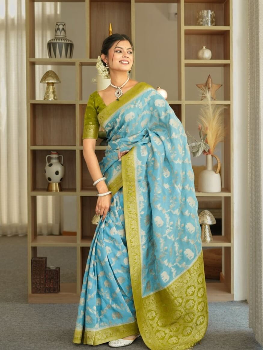Devastating Sky Soft Silk Saree With Glamorous Blouse Piece