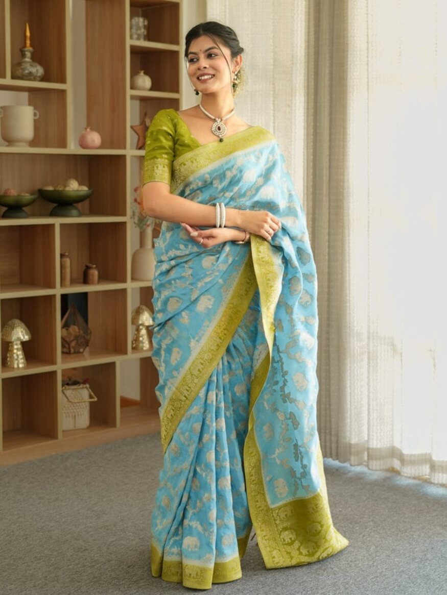 Devastating Sky Soft Silk Saree With Glamorous Blouse Piece