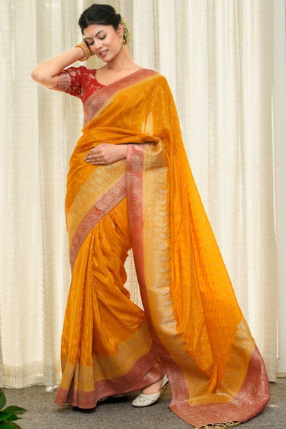 Lustrous Orange Soft Silk Saree With Elaborate Blouse Piece